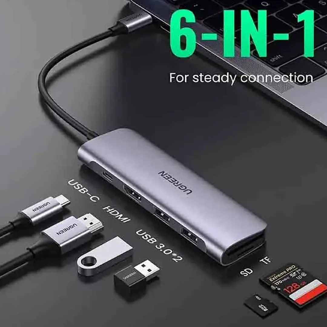 6-en-1 : USB-C + HDMI + 2x USB-A 3.0 + SD + TF — tout ce qu'il faut dans un hub aluminium