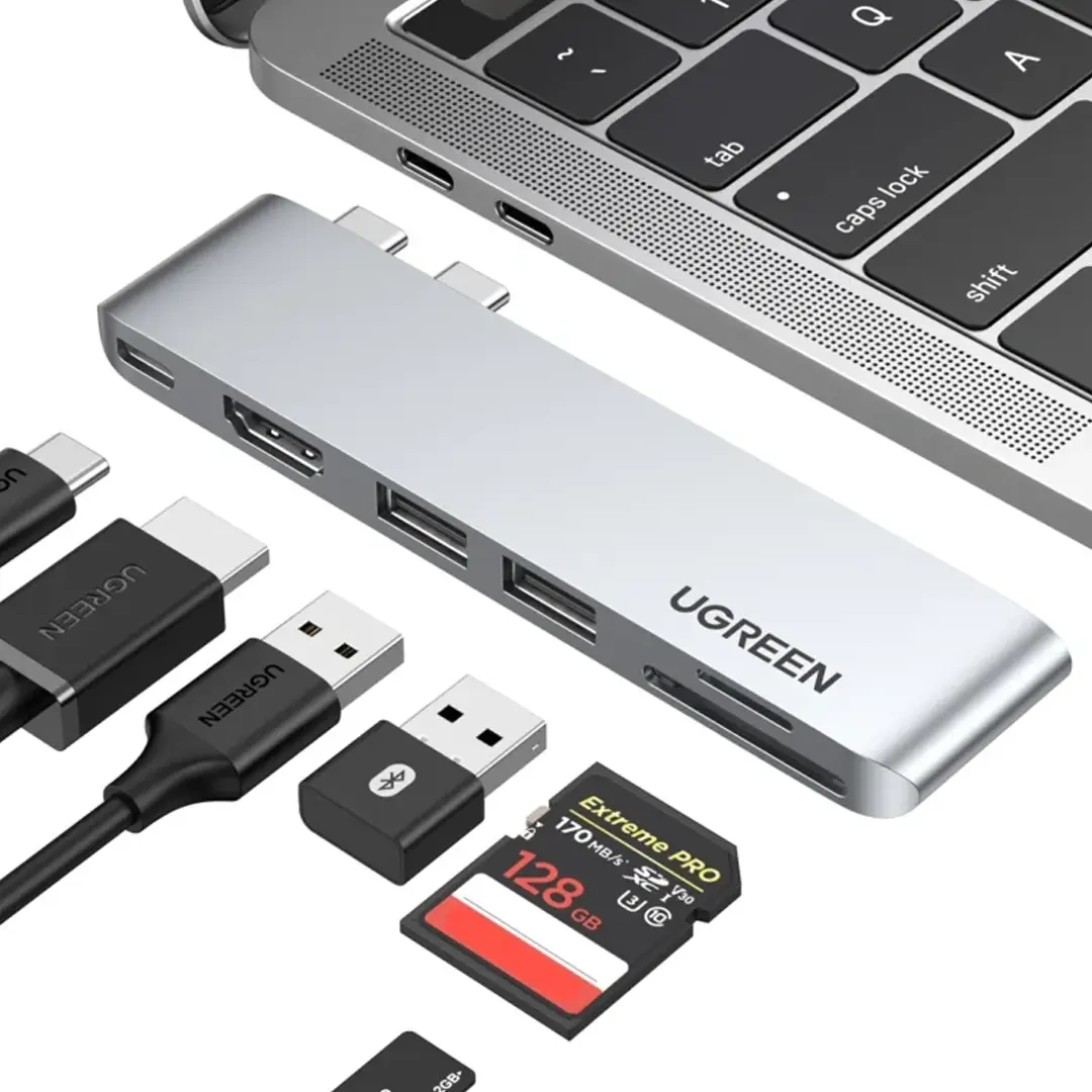 Double Thunderbolt + HDMI 4K 60Hz + USB-A + SD — 7 ports fixés directement sur la tranche de votre MacBook