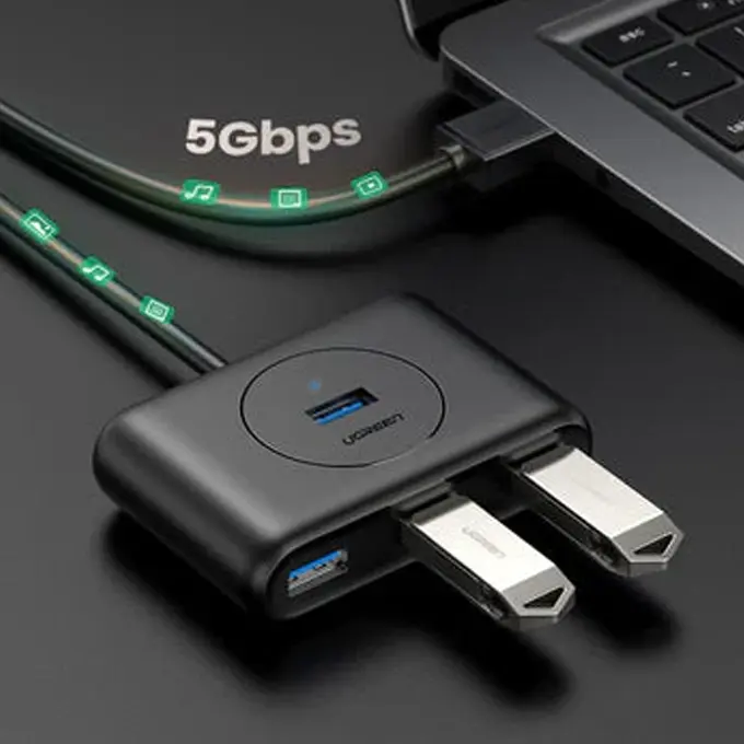 1 port USB-A → 4 ports USB-A 3.0 · Câble intégré · Design blanc — hub UGREEN CR113 pour MacBook et laptops avec peu de ports
