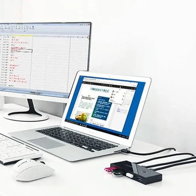 4 ports USB partagés entre 2 PC — commutation par bouton en 1 seconde